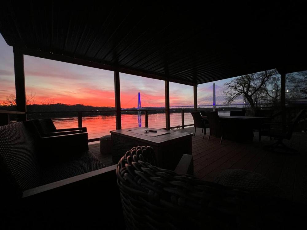 RiverSuite1 - A mesmerizing river and bridge view.